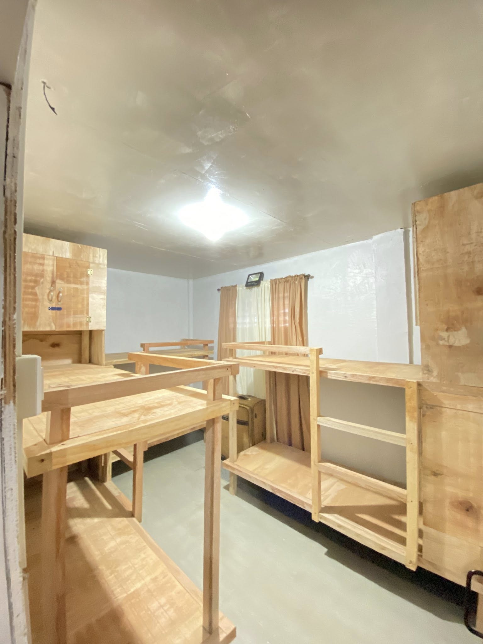 With own bed and cabinet