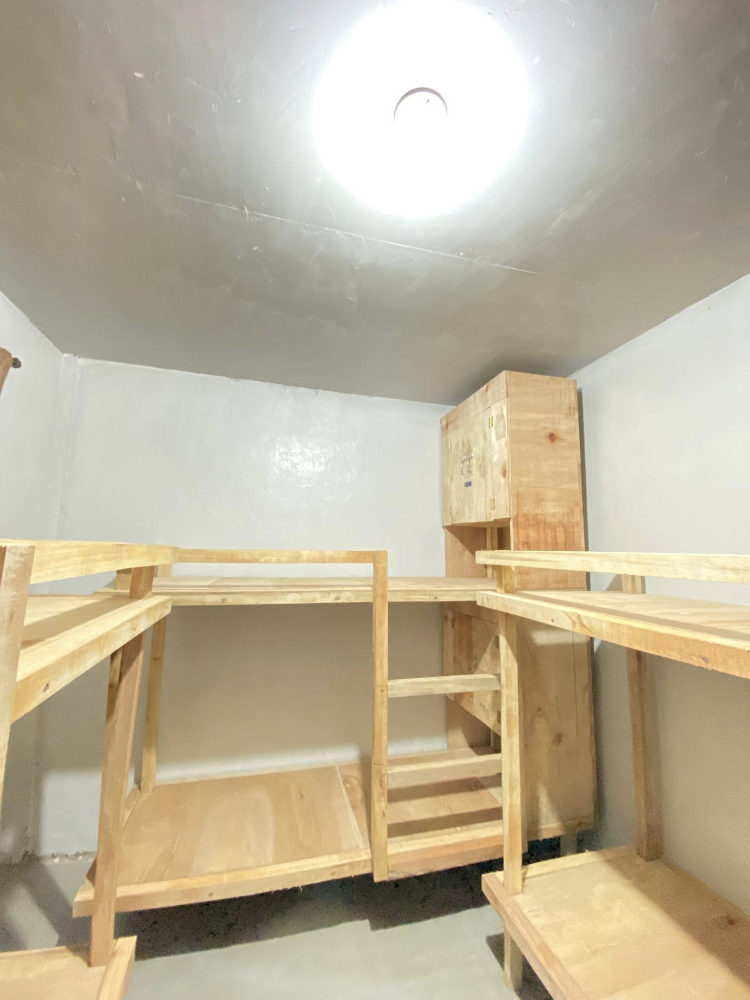 With own bed and cabinet